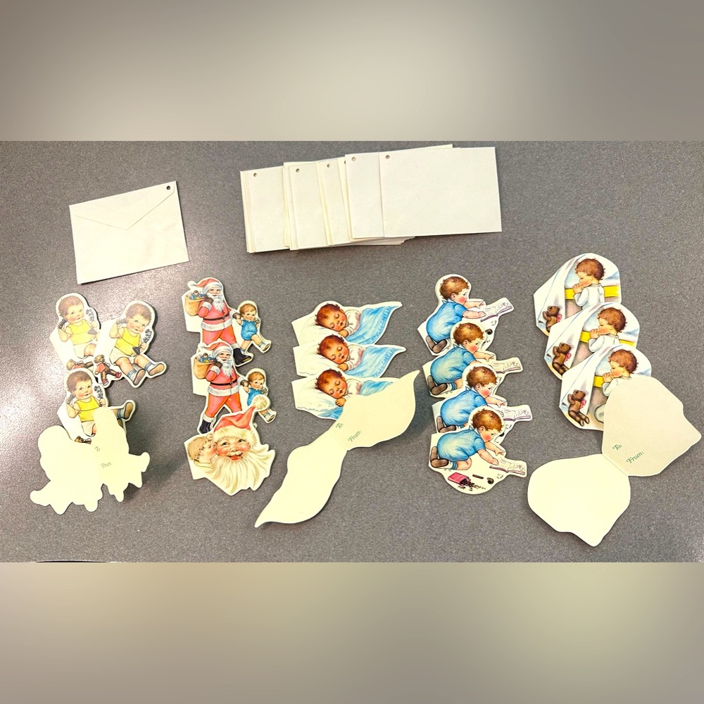 Set of 19 tags & 19 cards Adorable tags featuring babies and Santa Claus NOS